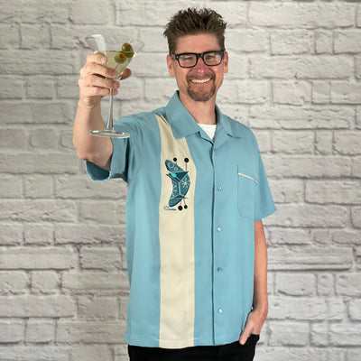 This loose, comfortable, and airy "Bottoms Up!" PopCheck Single Panel Bowling Shirt in Sea Foam/Stone is great for all you cool cats out there! It features an embroidered, retro styled, martini glass on a single stone panel on a sea foam polyester shirt and features contrast piping on the breast pocket.  
