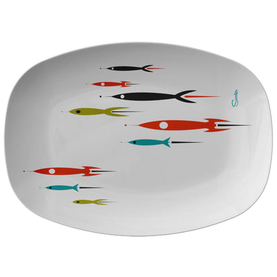 Scooter’s super fun, custom “Retro Rockets” 10x14” Serving Platter is the perfect retro addition to any dinner table! The “Retro Rockets” design is inspired by the vision of what futuristic rockets would look like back in the 1950's. The retro, fun shapes, colors and design also pay homage to my childhood influence of watching Flash Gordon.  These serving platters are manufactured from revolutionary ThermoSāf® Polymer that is: 